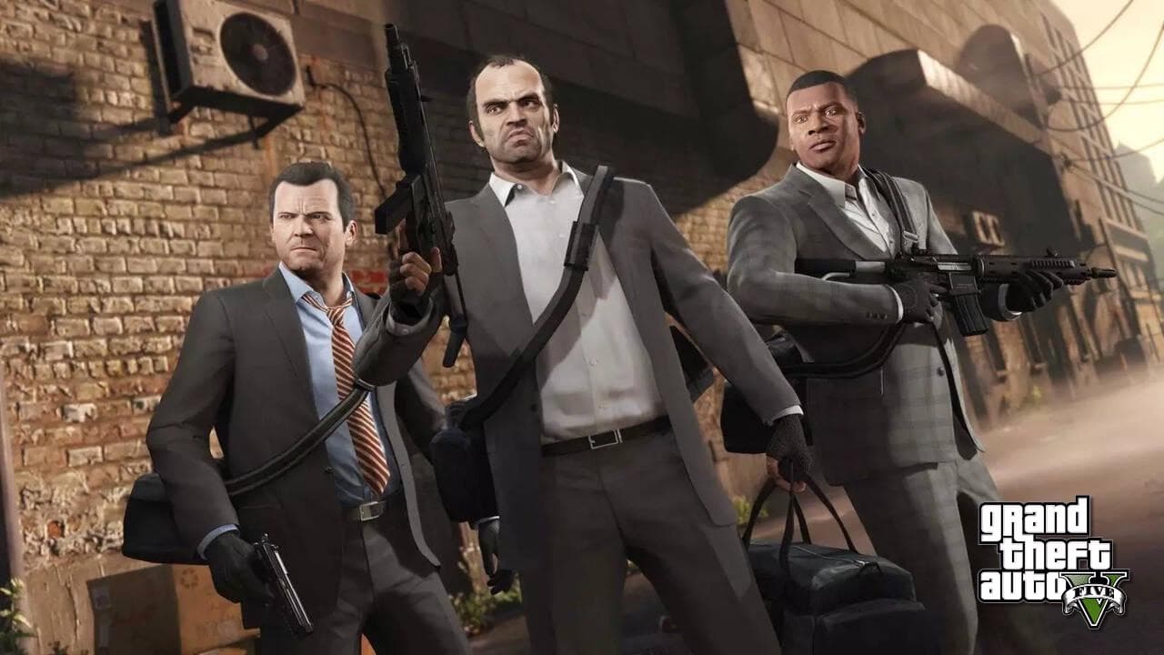Michael, Trevor and Franklin, the three GTA V protagonists, armed and in suits in front of a brick wall, with the Grand Theft Auto V logo.